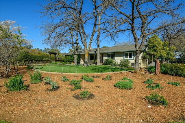 ranch-style house featuring a front lawn