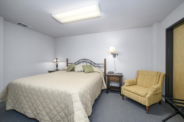 bedroom featuring visible vents and carpet