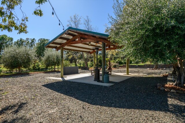 view of community with a gazebo and a patio area