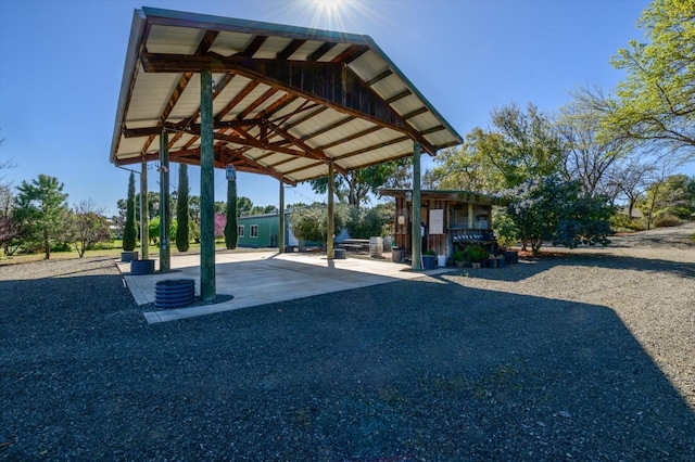 view of car parking featuring a carport