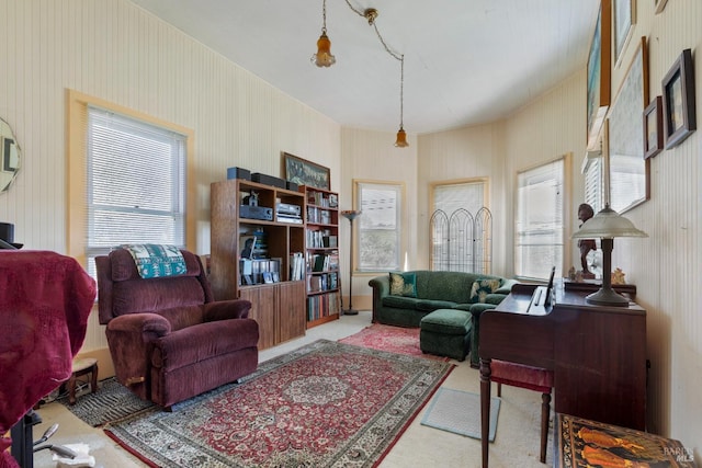 interior space with wallpapered walls and carpet flooring