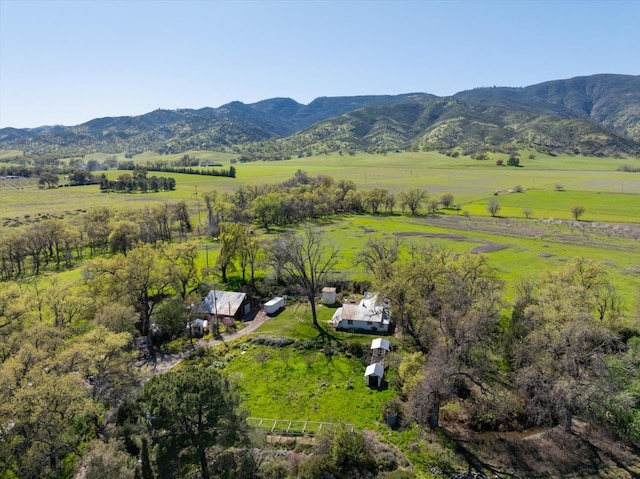 drone / aerial view with a mountain view and a rural view