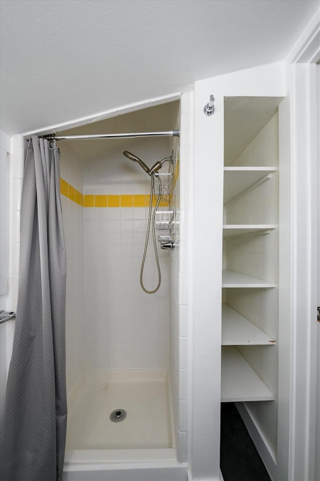 full bath featuring a stall shower