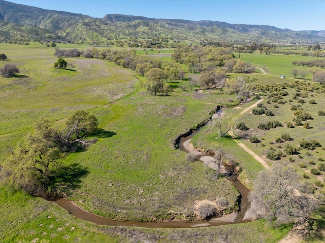 aerial view featuring a mountain view and a rural view