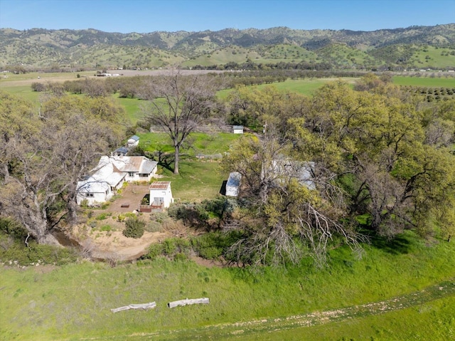 drone / aerial view featuring a rural view and a mountain view