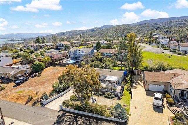 drone / aerial view with a mountain view and a residential view