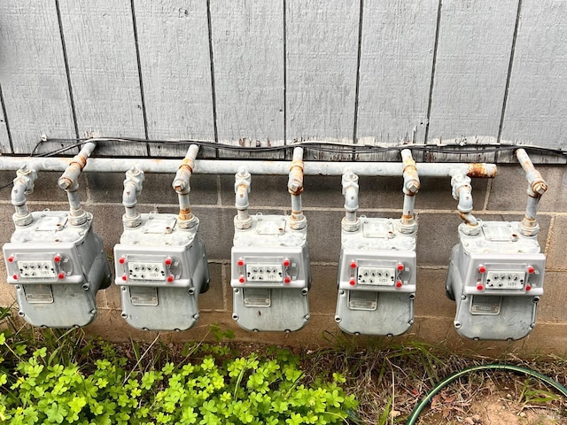 exterior details featuring gas meter