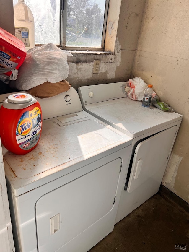 washroom featuring washer and dryer