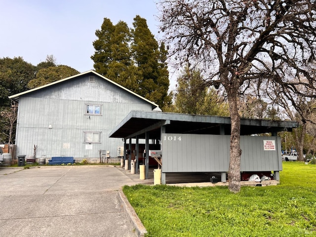 view of home's exterior featuring a yard