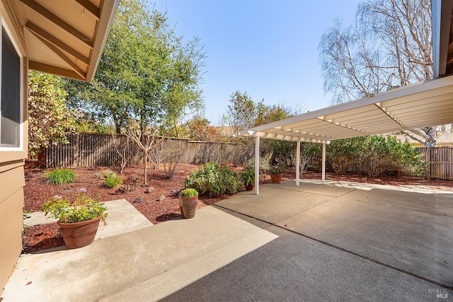 view of patio with a pergola and a fenced backyard