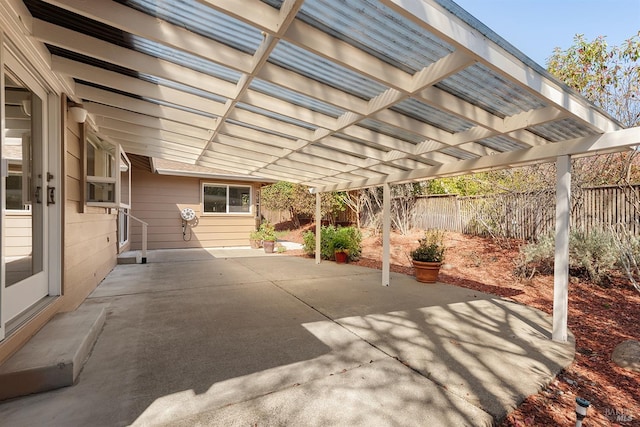 view of patio / terrace featuring a fenced backyard and a pergola