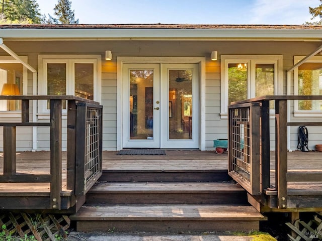 doorway to property featuring french doors and a deck