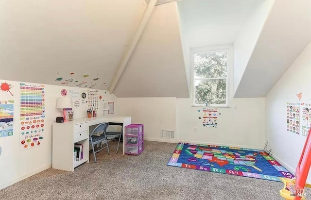 recreation room featuring vaulted ceiling, carpet flooring, and visible vents