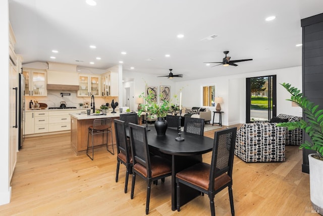 dining space with visible vents, light wood-style flooring, and recessed lighting