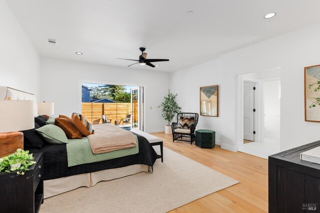 bedroom with recessed lighting, visible vents, ceiling fan, and wood finished floors