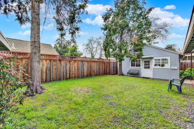 view of yard featuring a fenced backyard