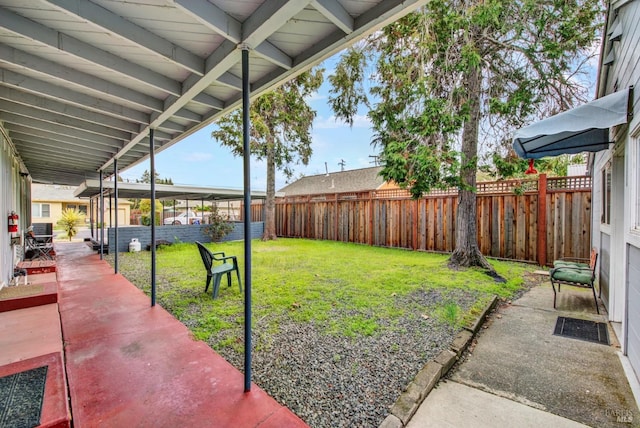 view of yard featuring a fenced backyard and a patio