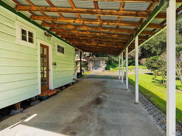 view of patio / terrace featuring an attached carport