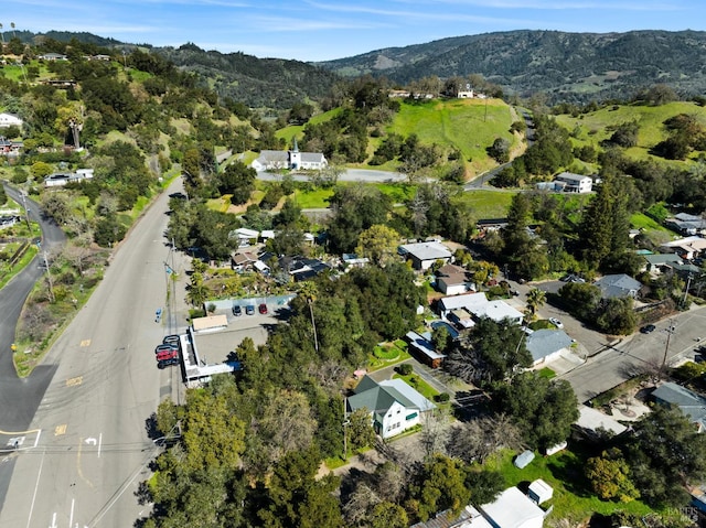 drone / aerial view featuring a mountain view and a residential view