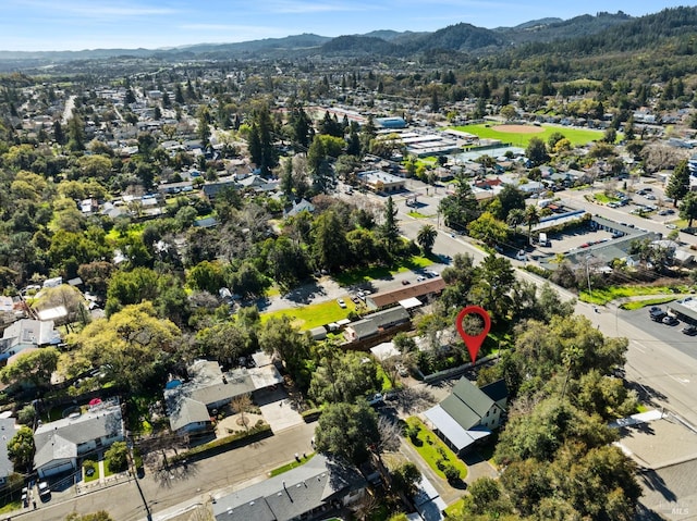 bird's eye view with a mountain view