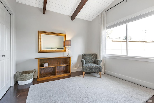 living area featuring wood ceiling, vaulted ceiling with beams, baseboards, and wood finished floors