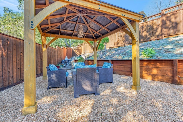 view of patio featuring an outdoor living space, a fenced backyard, and grilling area