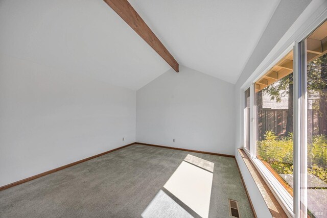 bonus room featuring lofted ceiling with beams, visible vents, baseboards, and carpet flooring