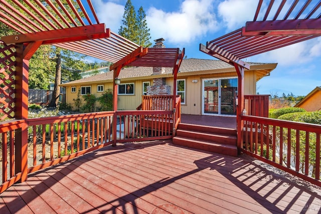 wooden terrace with a pergola