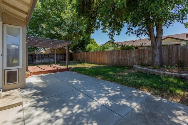 view of patio featuring a pergola and a fenced backyard