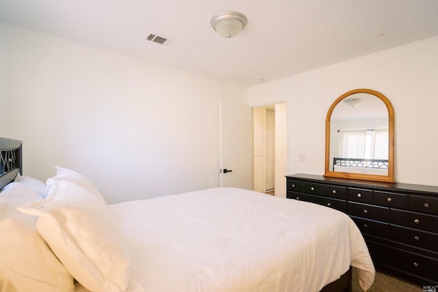 bedroom with visible vents