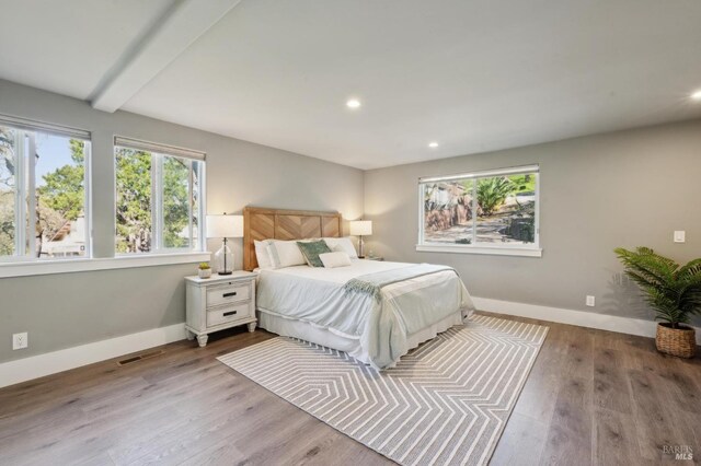 3292 Holland Dr, Santa Rosa, CA 95404 - bedroom featuring wood finished floors, visible vents, baseboards, recessed lighting, and beamed ceiling