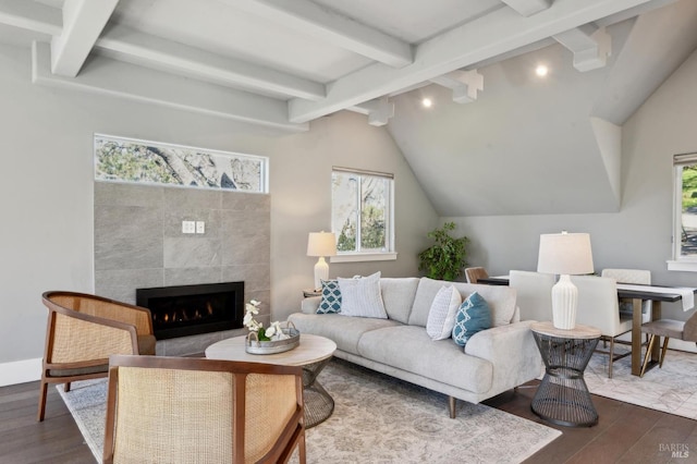 3292 Holland Dr, Santa Rosa, CA 95404 - living room with a tile fireplace, vaulted ceiling with beams, baseboards, and wood finished floors