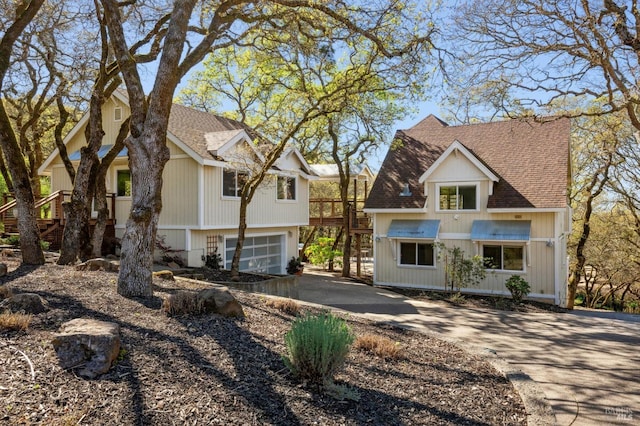 3292 Holland Dr, Santa Rosa, CA 95404 - view of front facade with aphalt driveway, a garage, and a shingled roof