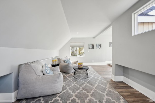 3292 Holland Dr, Santa Rosa, CA 95404 - living room featuring vaulted ceiling, wood finished floors, and baseboards