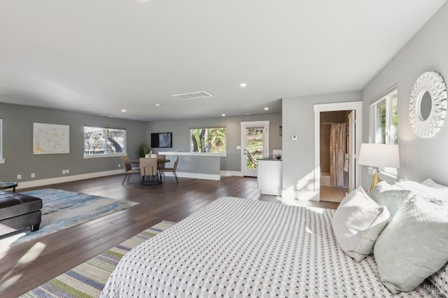 3292 Holland Dr, Santa Rosa, CA 95404 - living room featuring visible vents, a healthy amount of sunlight, baseboards, and hardwood / wood-style flooring