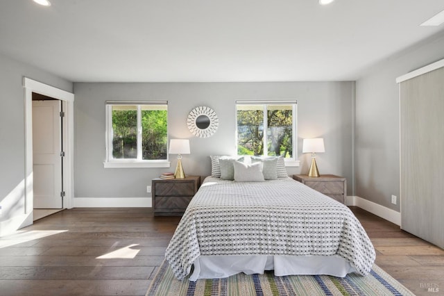3292 Holland Dr, Santa Rosa, CA 95404 - bedroom with hardwood / wood-style floors, multiple windows, and baseboards