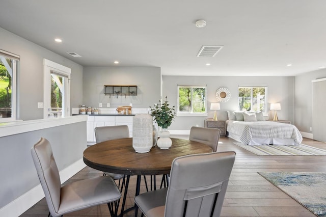 3292 Holland Dr, Santa Rosa, CA 95404 - dining area featuring recessed lighting, visible vents, wood-type flooring, and baseboards