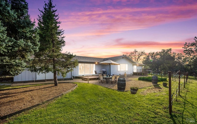 view of yard featuring a patio and fence