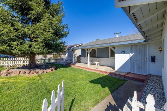 view of yard with fence