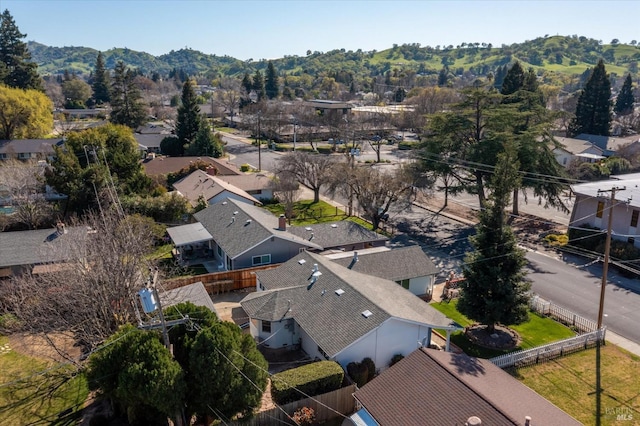 birds eye view of property with a residential view