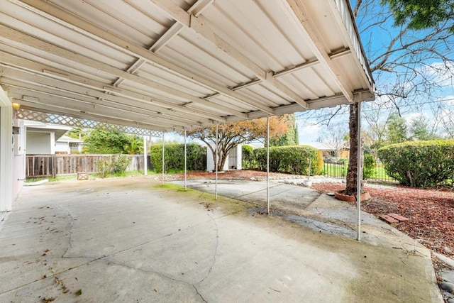 view of patio featuring fence