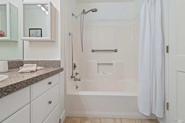 full bath featuring vanity and shower / bath combo with shower curtain