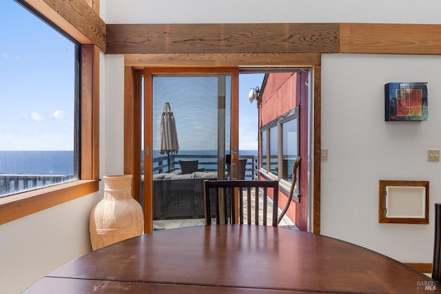 dining area with a water view