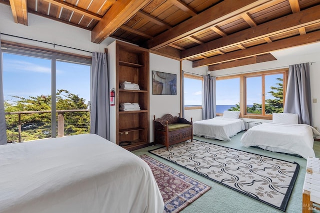 carpeted bedroom with beam ceiling and wood ceiling