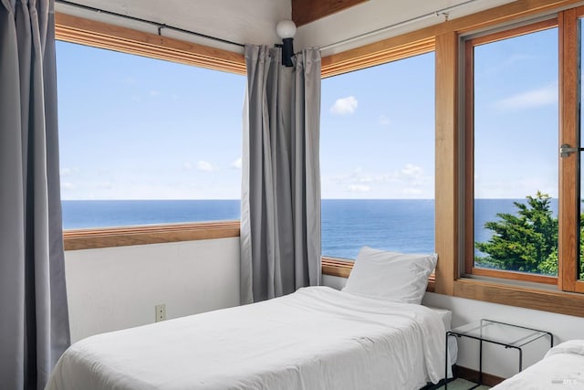 bedroom with a water view