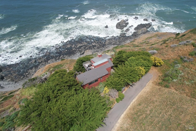 drone / aerial view with a water view