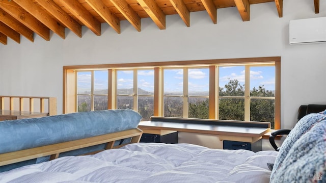 bedroom with an AC wall unit, beam ceiling, and multiple windows