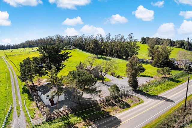 birds eye view of property featuring a rural view