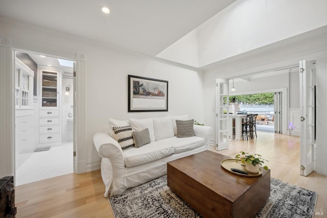 living room featuring recessed lighting and light wood-type flooring