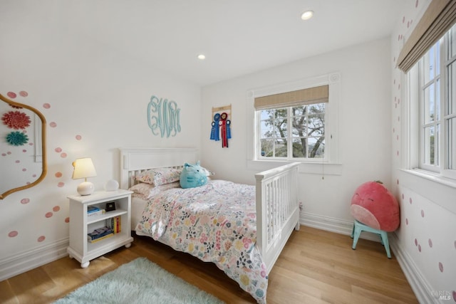 bedroom featuring recessed lighting, baseboards, and wood finished floors